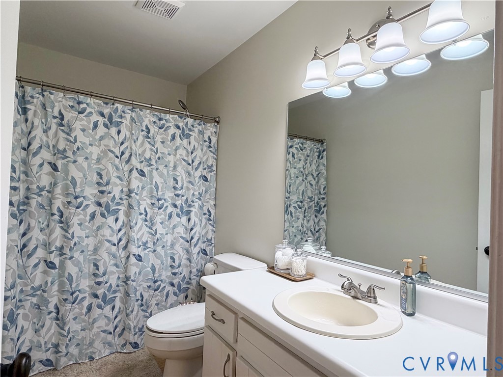 4924 Wilconna Road Chesterfield, VA 23832 - Photo 16 of 22 Bathroom featuring a vanity with an integrated sin