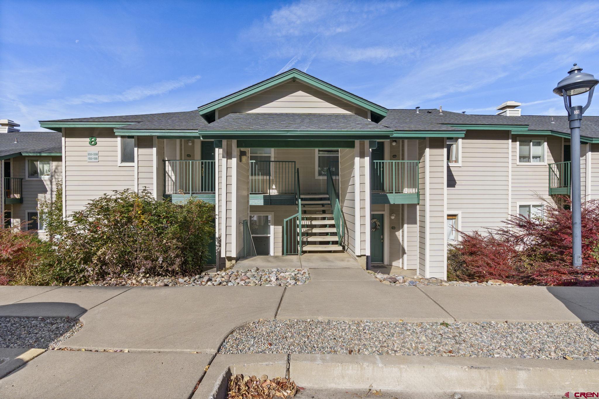 1100 Goeglein Gulch Road, Unit 233 Durango, CO 81301 - Photo 25 of 37 front view of a house with a porch