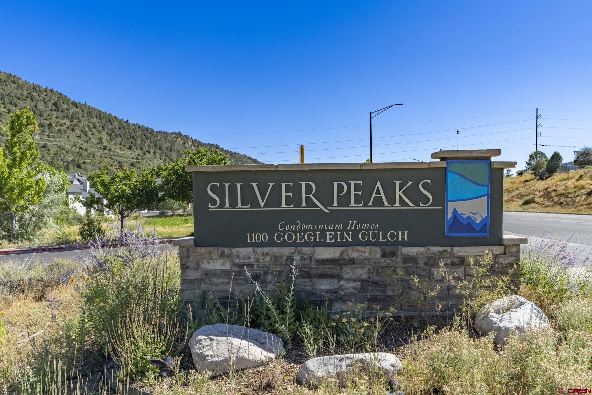 1100 Goeglein Gulch Road, Unit 233 Durango, CO 81301 - Photo 27 of 37 a sign on the side of a building