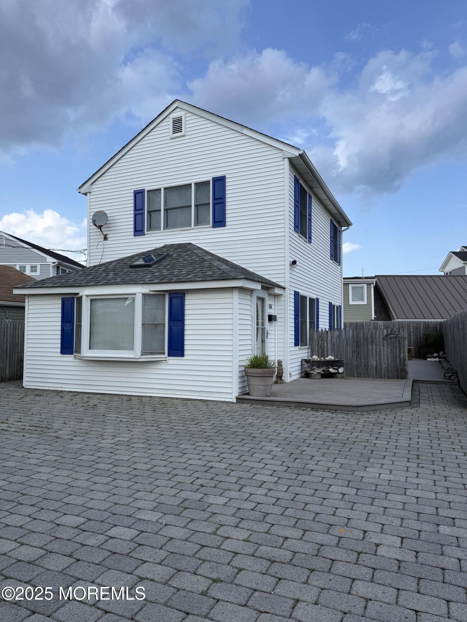 a view of a house with a patio