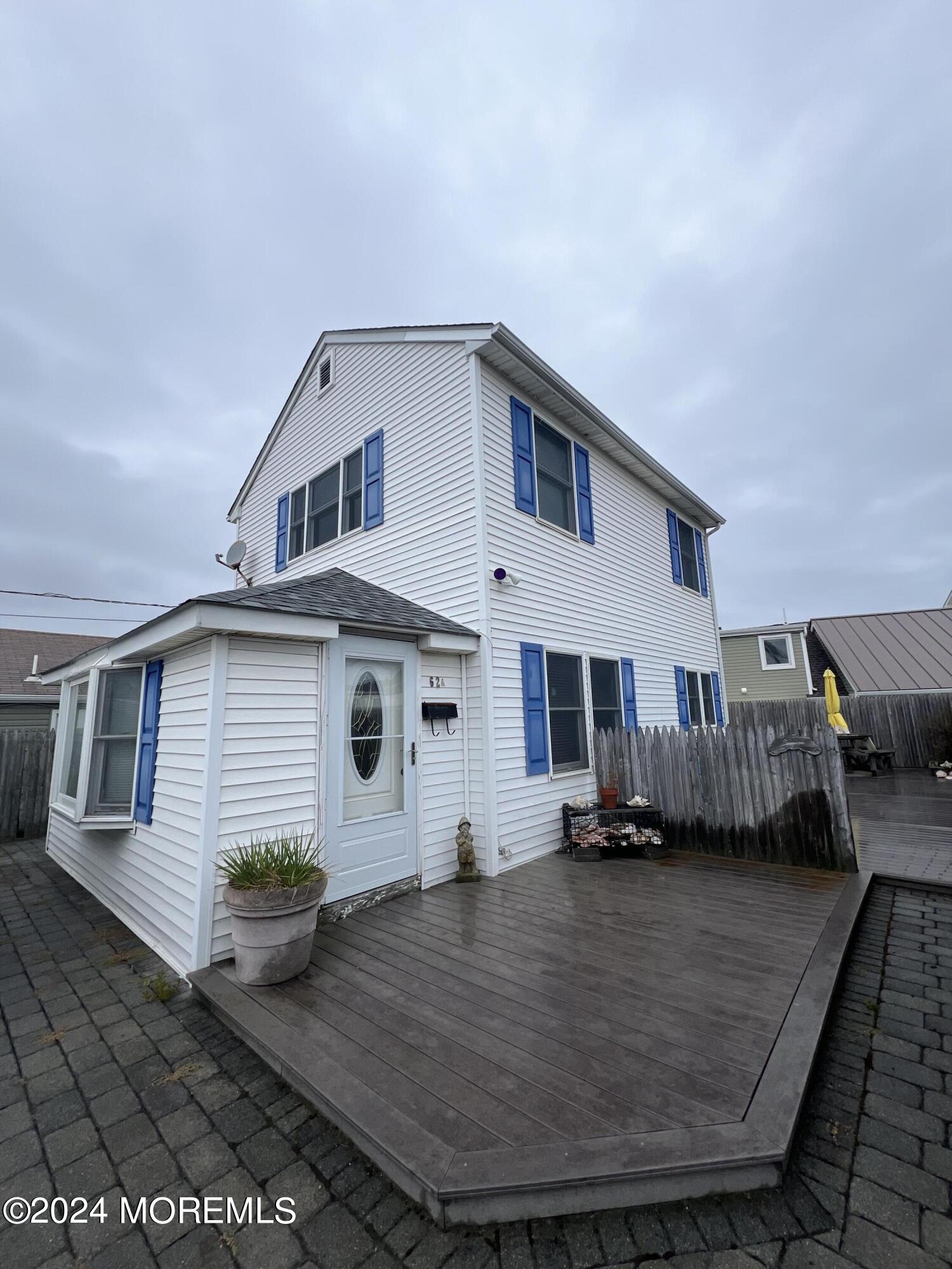 62 A Inlet Drive Point Pleasant Beach, NJ 08742 - Photo 16 of 24 a view of a house with a patio