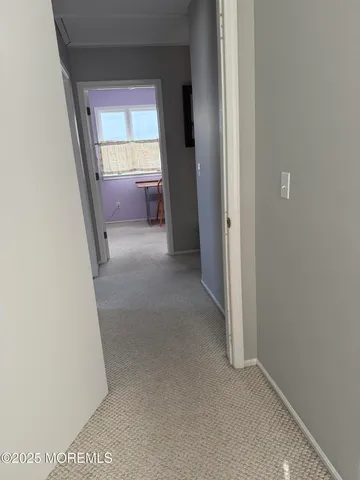 a view of hallway with window