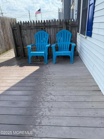 a view of a two chairs in the roof deck