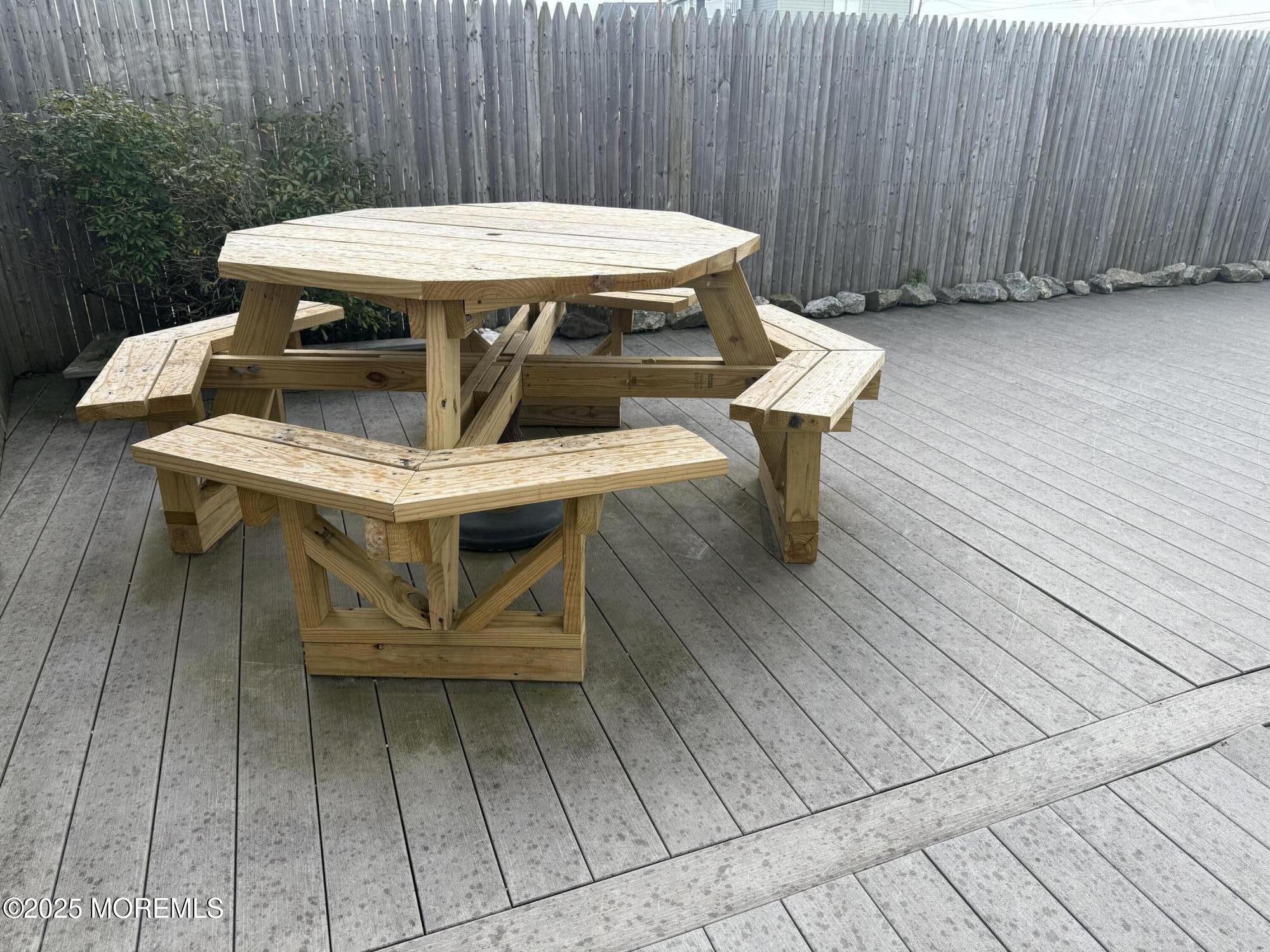 62 A Inlet Drive Point Pleasant Beach, NJ 08742 - Photo 5 of 24 a view of a tables and chairs in patio