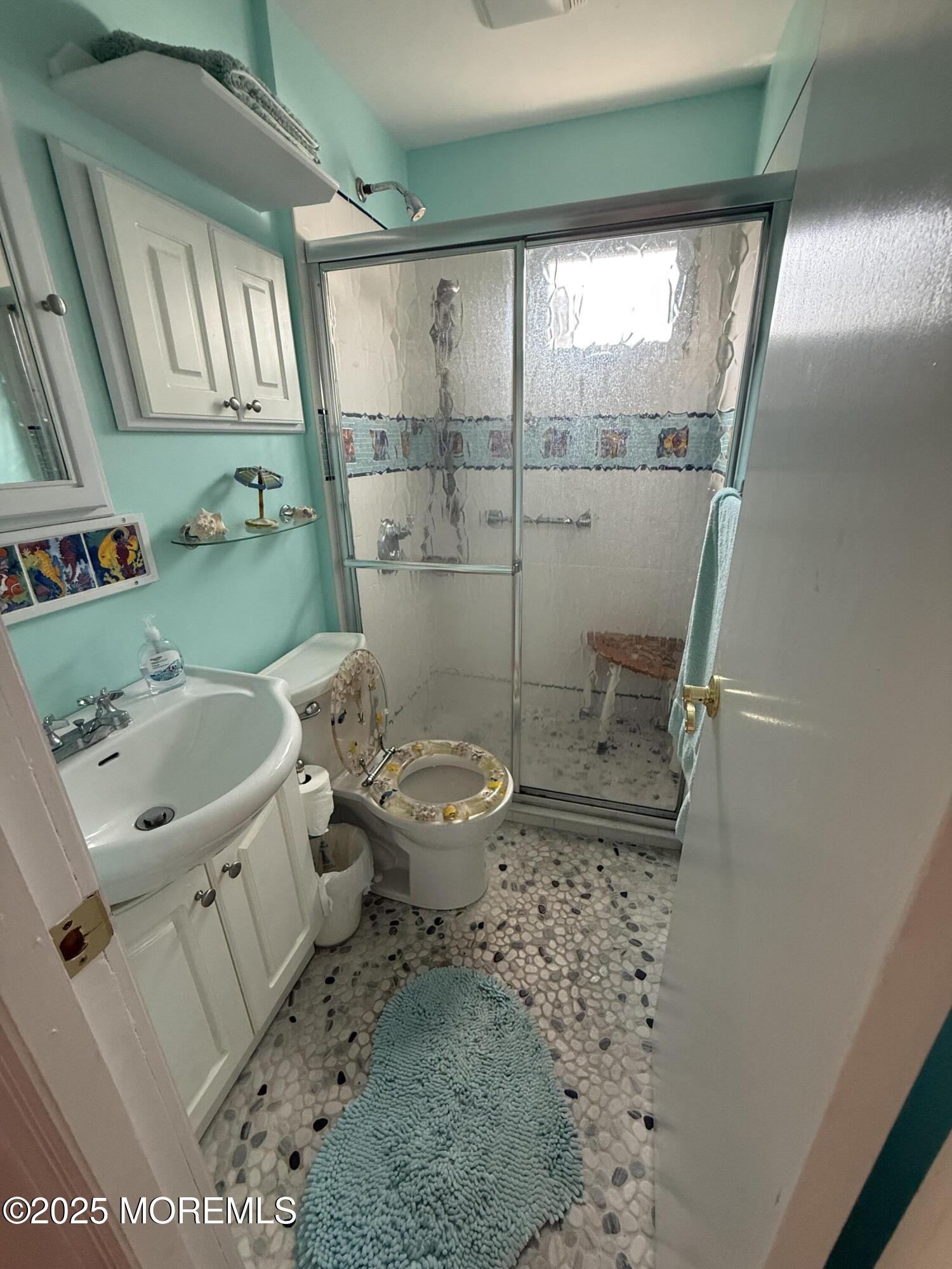 62 A Inlet Drive Point Pleasant Beach, NJ 08742 - Photo 7 of 24 a bathroom with a sink toilet and shower