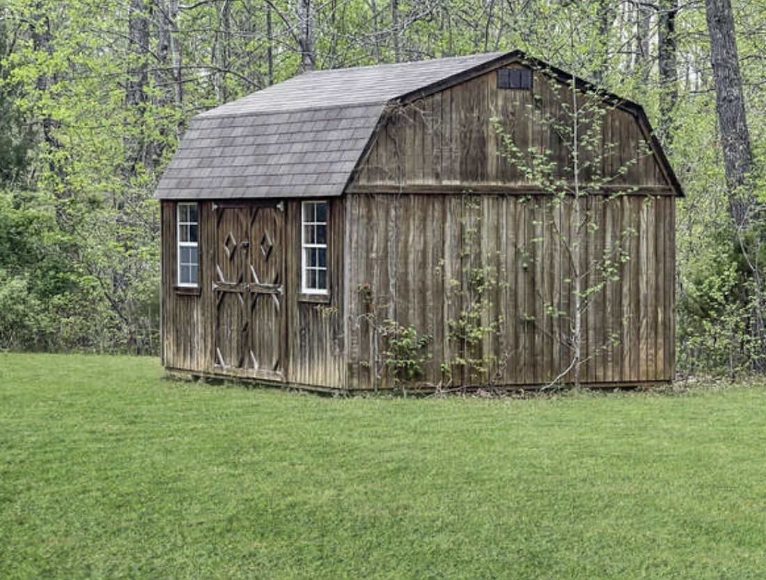 237 Higgs Road Big Rock, TN 37023 - Photo 12 of 19 a backyard of a house with lots of green space