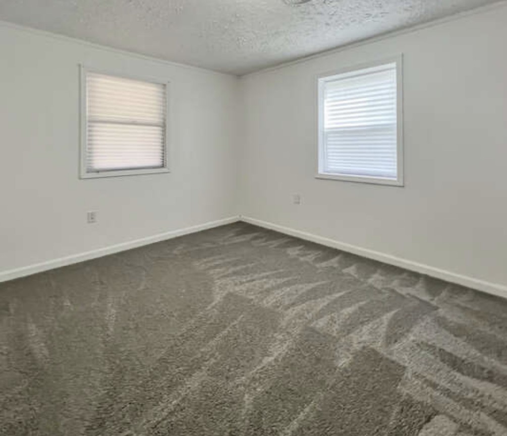 237 Higgs Road Big Rock, TN 37023 - Photo 7 of 19 an empty room with a window