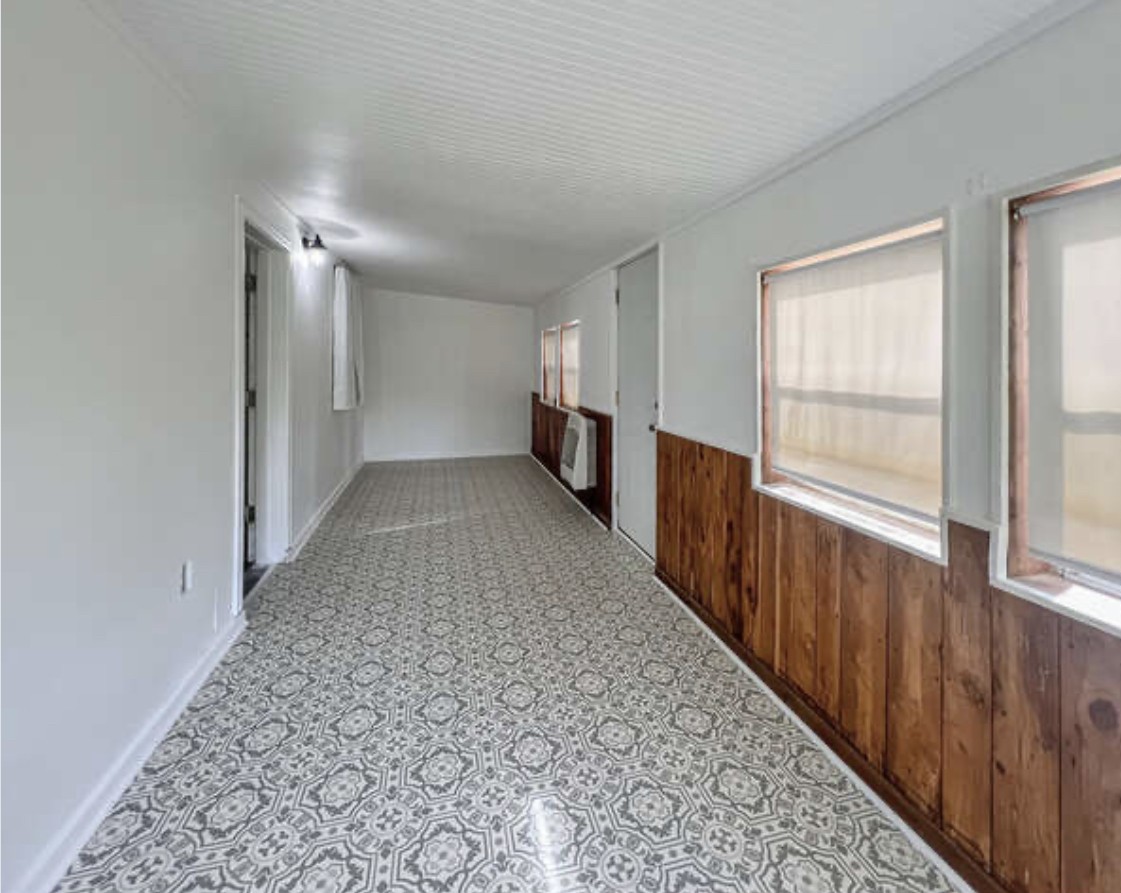 237 Higgs Road Big Rock, TN 37023 - Photo 10 of 19 a view of a hallway with windows