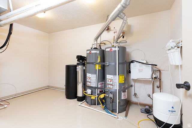 888 East Fiddlers Canyon Road Cedar City, UT 84721 - Photo 55 of 74 Utility room featuring water heater