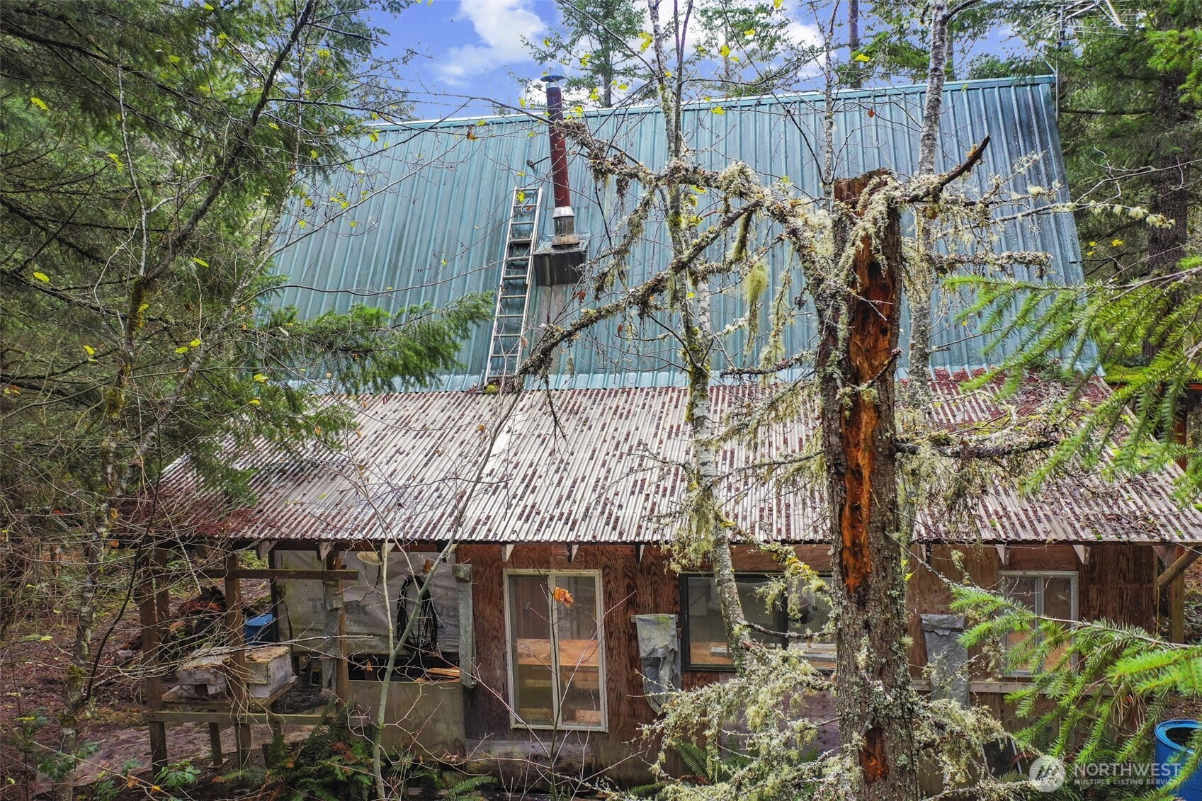 15411 Alder Mashel Connection Road East Eatonville, WA 98328 - Photo 11 of 18 a view of outdoor space with a wooden fence