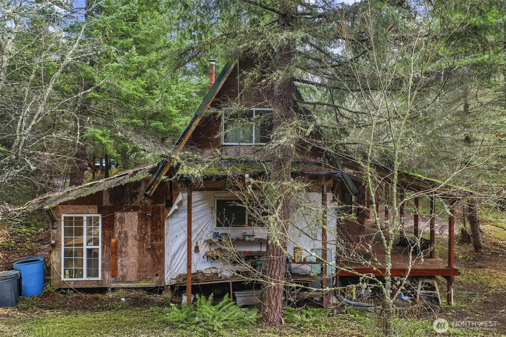 15411 Alder Mashel Connection Road East Eatonville, WA 98328 - Photo 14 of 18 a aerial view of a house with a yard