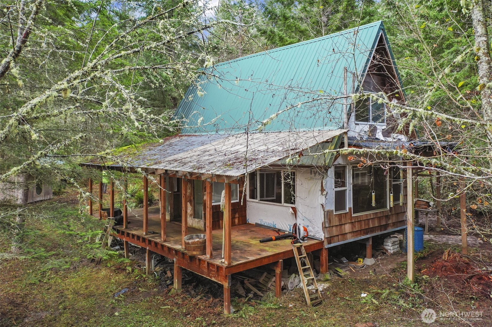 15411 Alder Mashel Connection Road East Eatonville, WA 98328 - Photo 15 of 18 an aerial view of a house with a yard