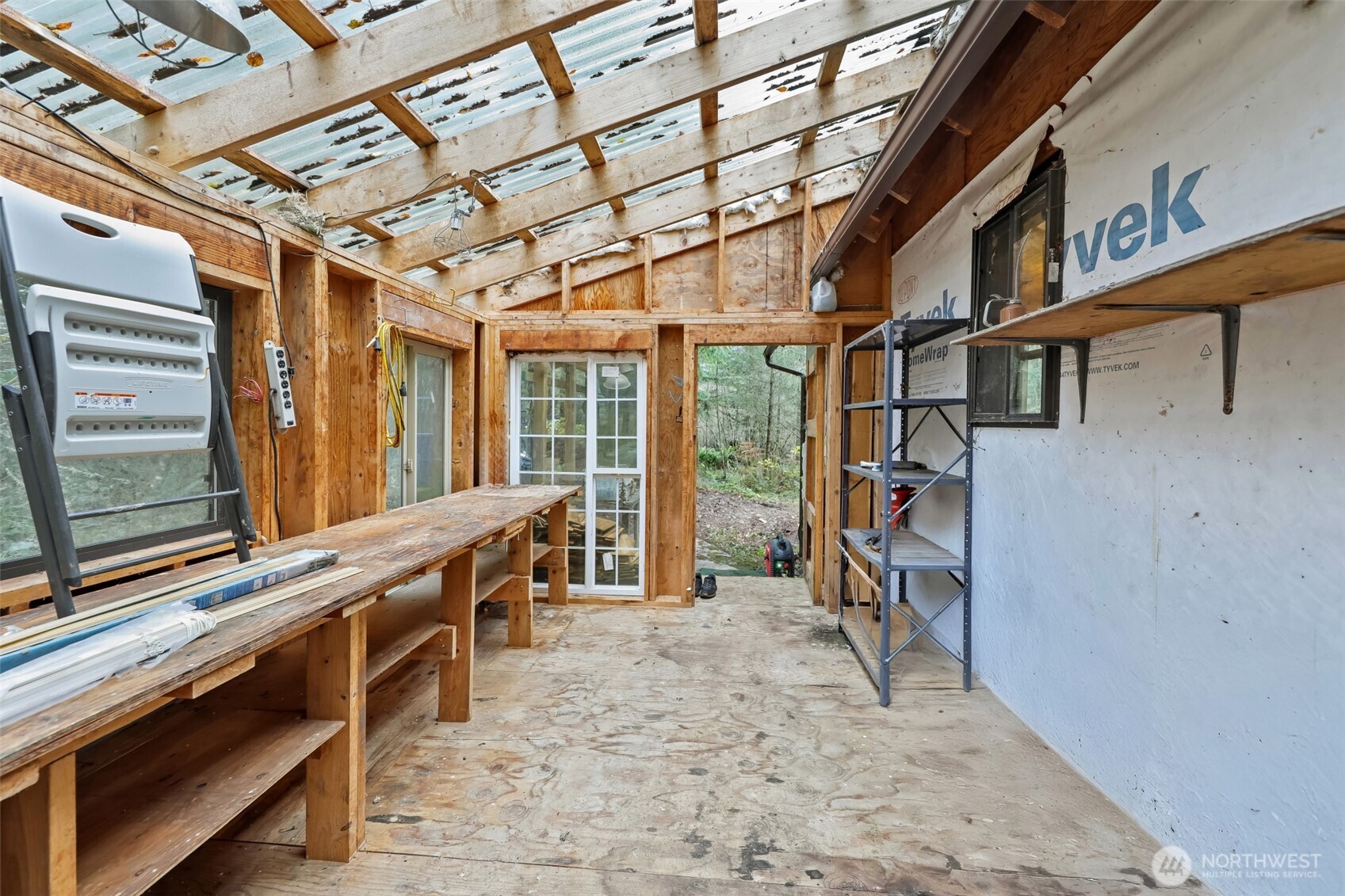 15411 Alder Mashel Connection Road East Eatonville, WA 98328 - Photo 17 of 18 a view of a chairs with a roof
