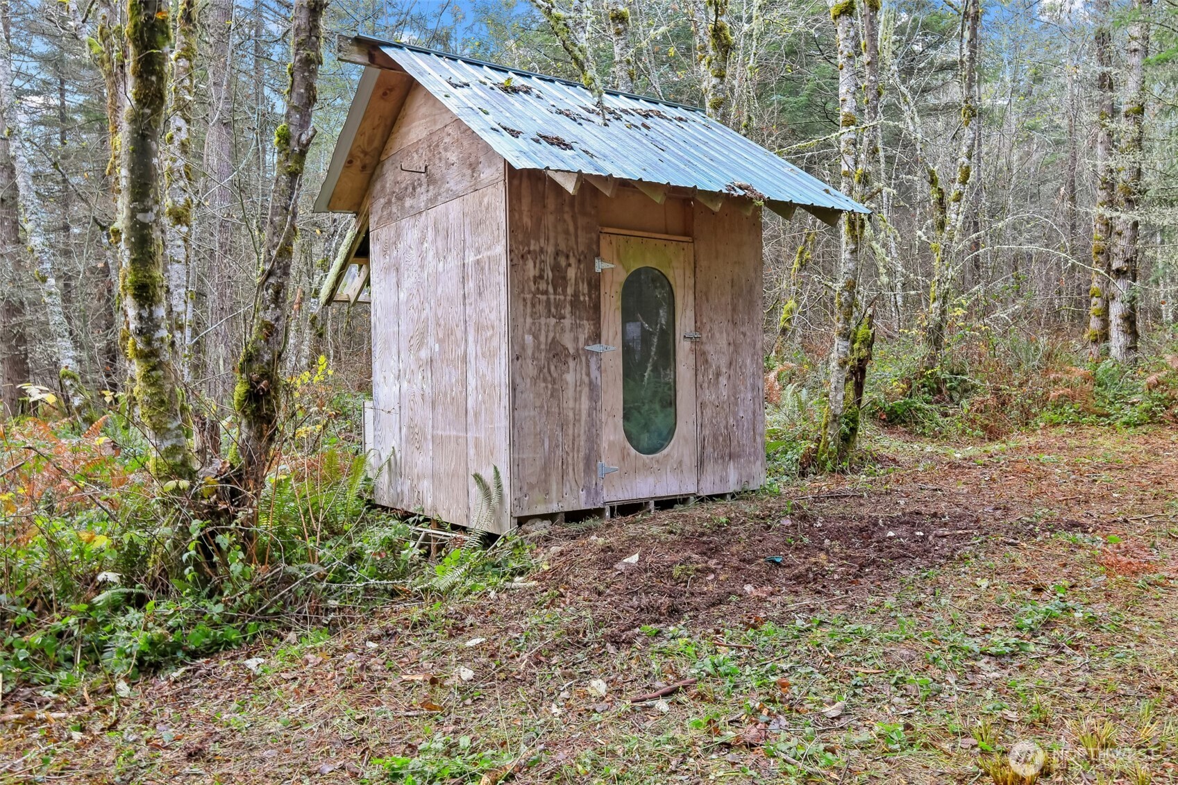 15411 Alder Mashel Connection Road East Eatonville, WA 98328 - Photo 18 of 18 a view of a barn with large trees
