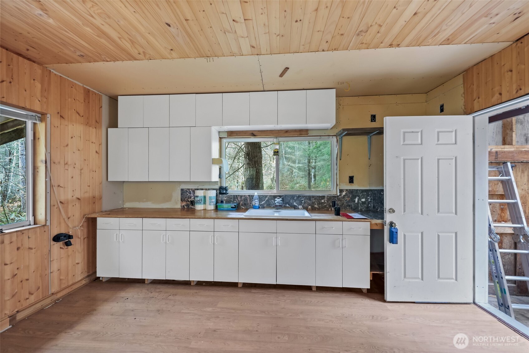 15411 Alder Mashel Connection Road East Eatonville, WA 98328 - Photo 2 of 18 a kitchen with sink and cabinets