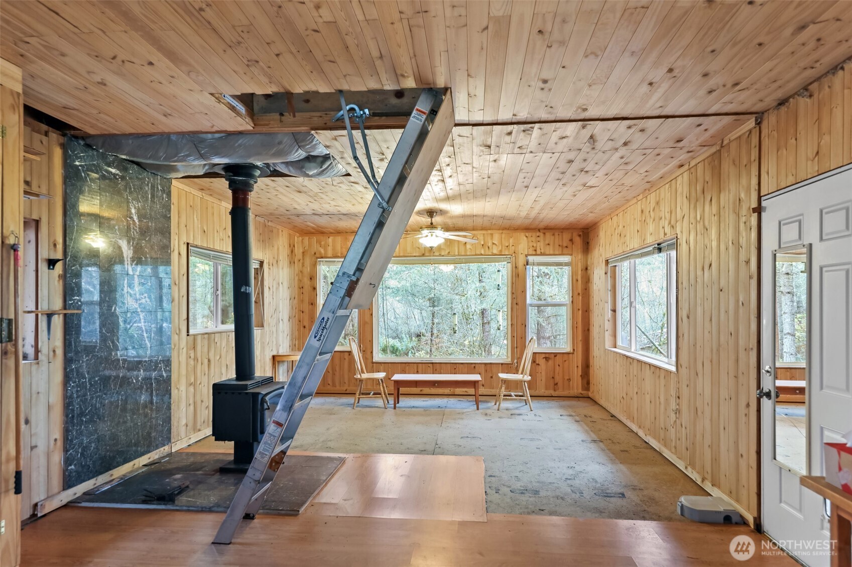 15411 Alder Mashel Connection Road East Eatonville, WA 98328 - Photo 3 of 18 a view of an empty room with a window