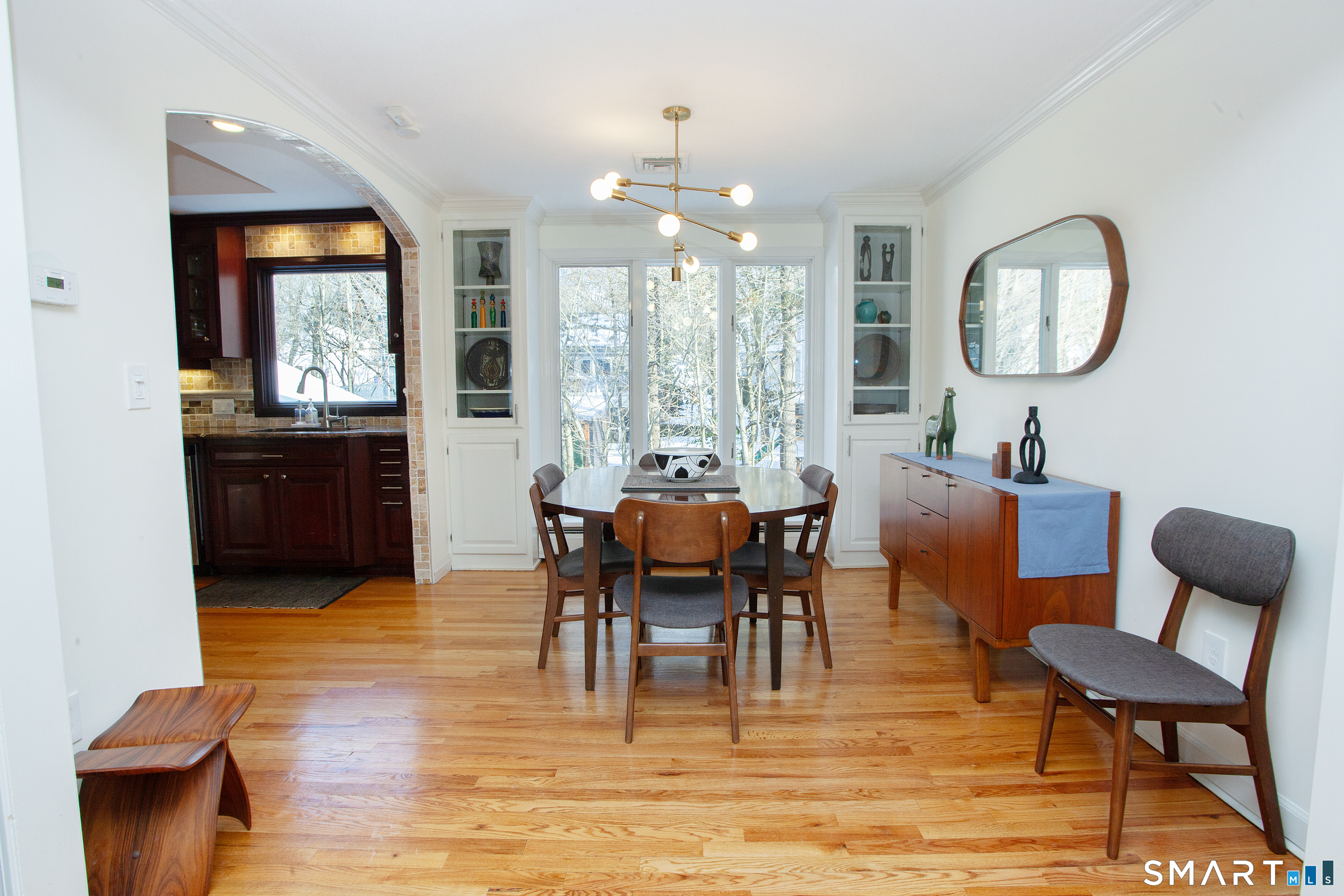 60 Ridgebrook Drive West Hartford, CT 06107 - Photo 16 of 40 Dining room with picture window and built ins