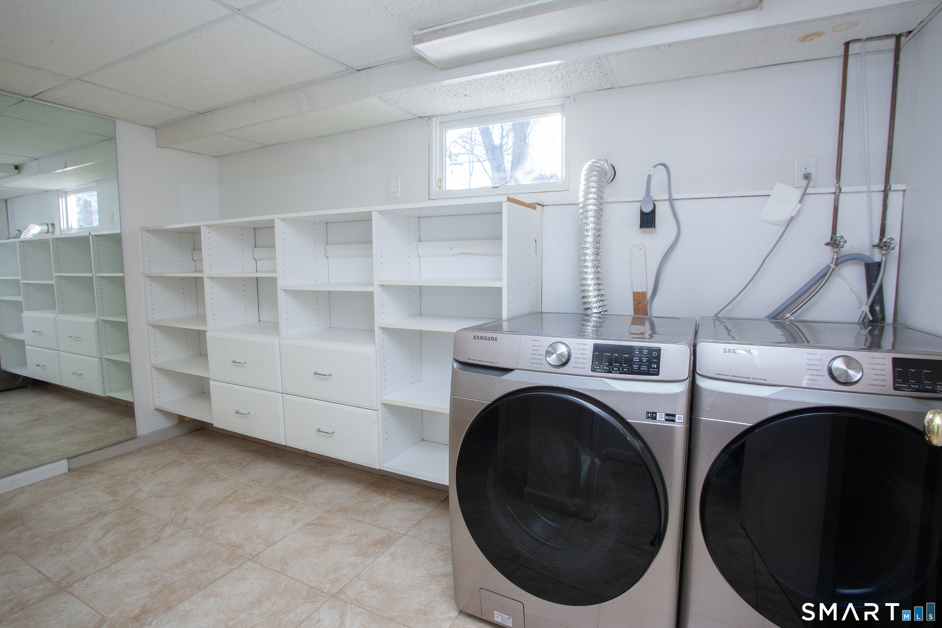 60 Ridgebrook Drive West Hartford, CT 06107 - Photo 32 of 40 new Samsung front load washer and dryer stay with the home!