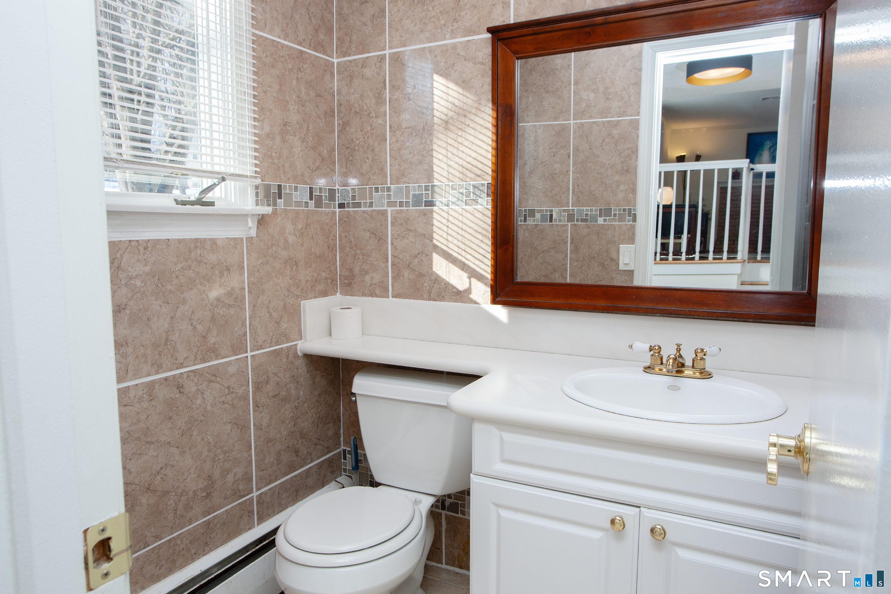 60 Ridgebrook Drive West Hartford, CT 06107 - Photo 4 of 40 first floor half bath