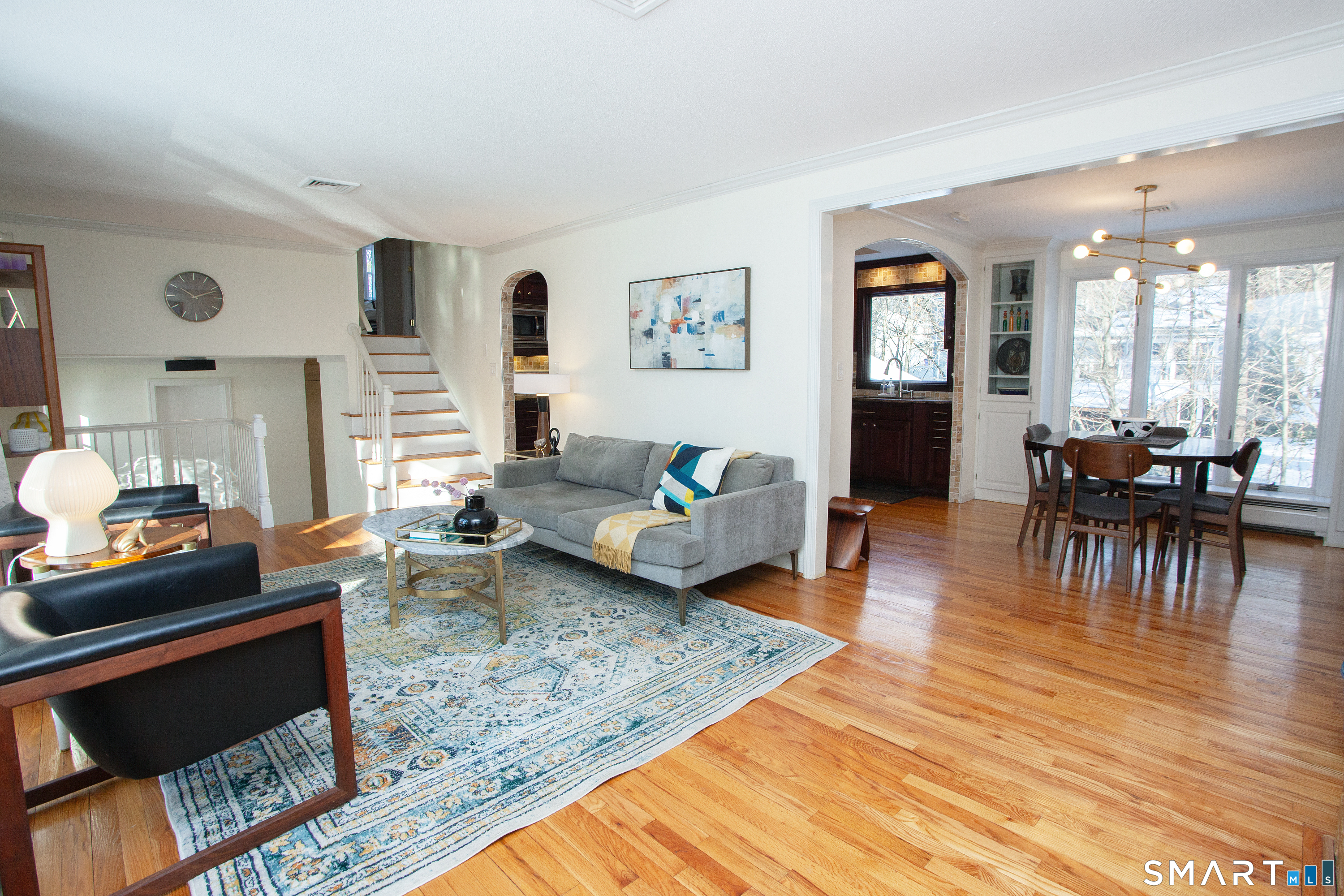 60 Ridgebrook Drive West Hartford, CT 06107 - Photo 9 of 40 living room looking toward dining room