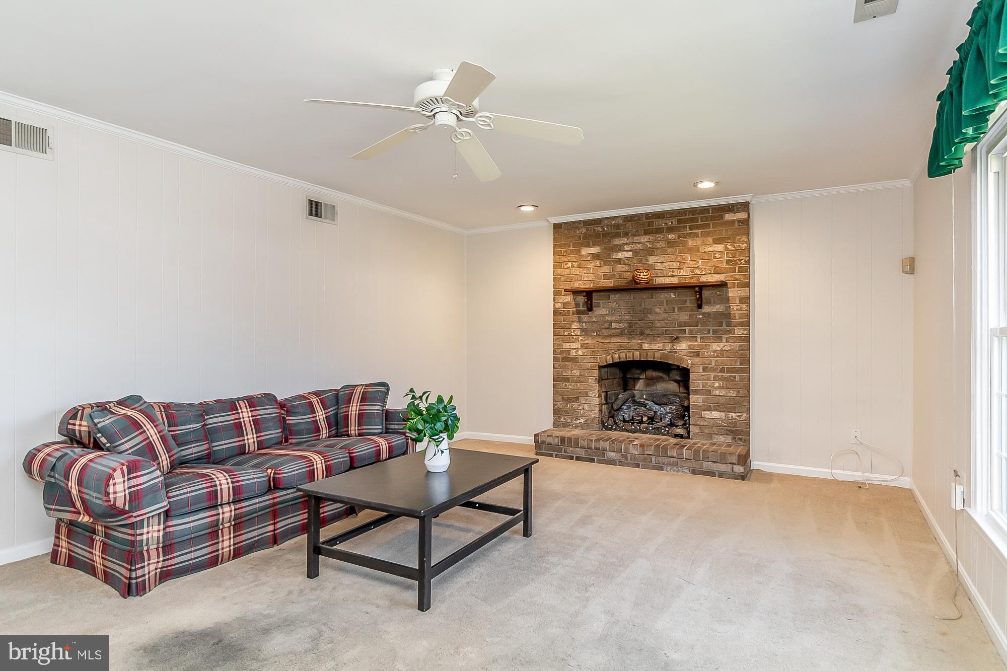 822 Staffordshire Road Cockeysville, MD 21030 - Photo 12 of 27 Cozy up to the gas FP in Main level family room