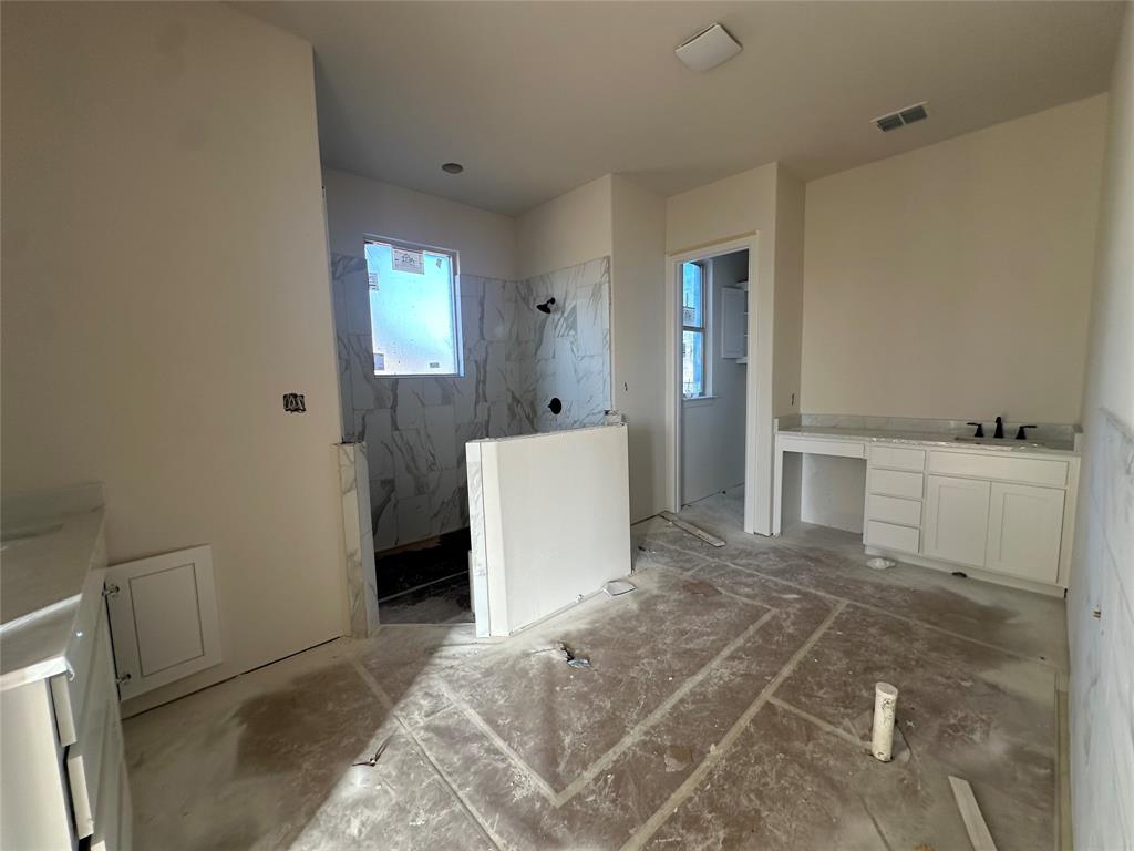 201 Stuart Street Paradise, TX 76073 - Photo 14 of 18 a view of a storage & utility room with a sink
