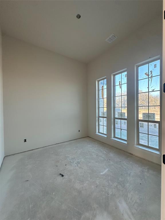 201 Stuart Street Paradise, TX 76073 - Photo 4 of 18 a view of an empty room with a window