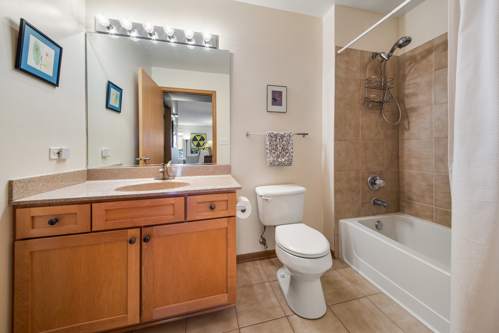 515 Main Street, Unit 505 Evanston, IL 60202 - Photo 12 of 15 a bathroom with a sink toilet and shower