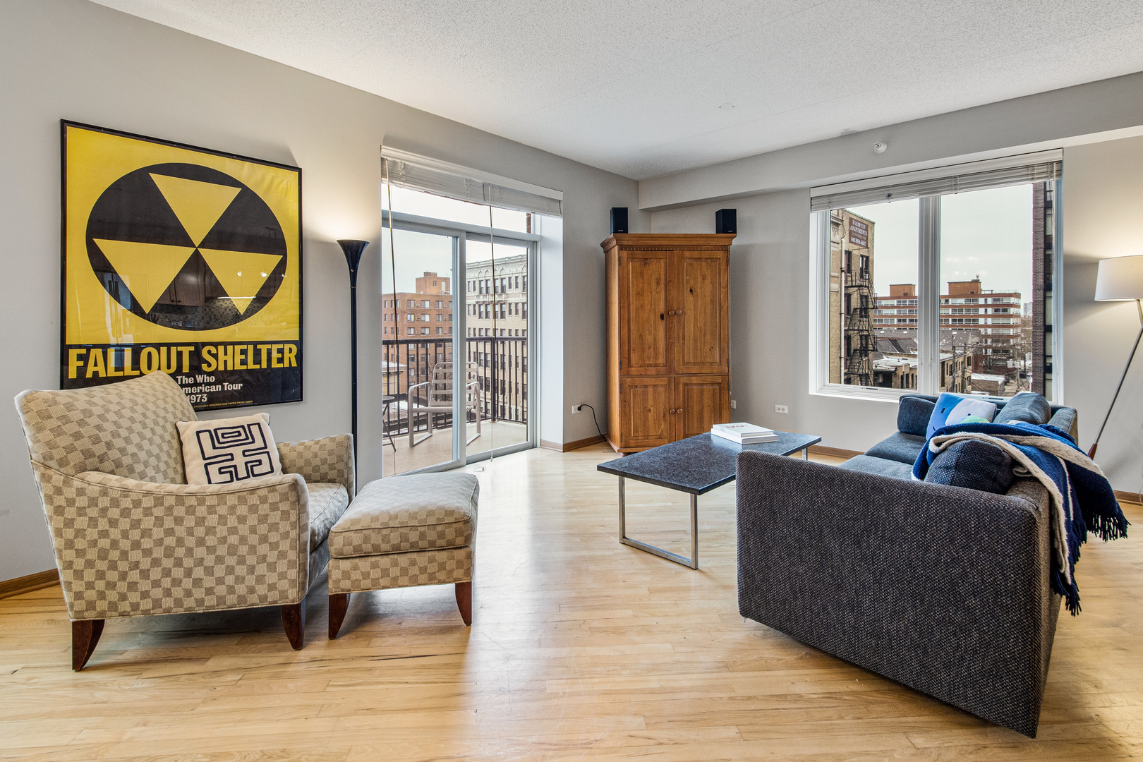 515 Main Street, Unit 505 Evanston, IL 60202 - Photo 6 of 15 a living room with furniture and a floor to ceiling window