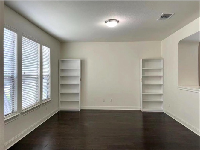 508 Tyree Road Cedar Park, TX 78613 - Photo 3 of 22 wooden floor in an empty room with a window