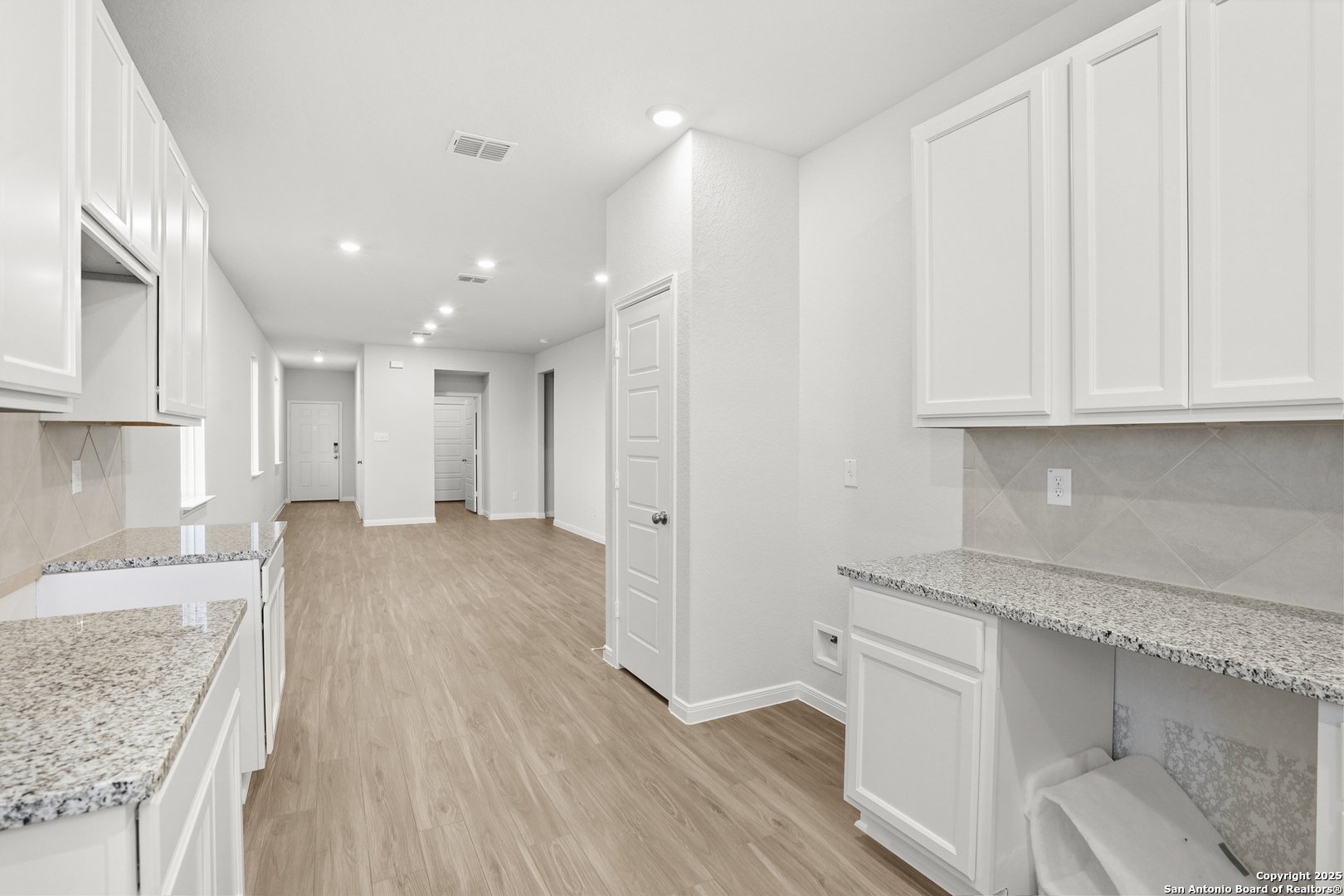 3211 Katzer Lane Converse, TX 78109 - Photo 11 of 28 a view of a kitchen with granite countertop cabinets