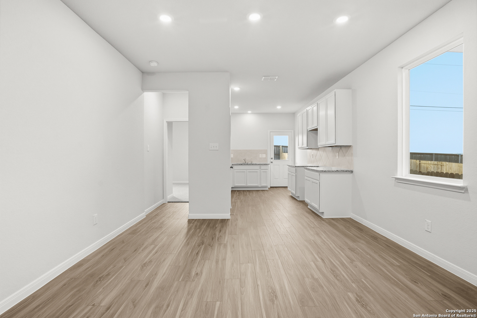 3211 Katzer Lane Converse, TX 78109 - Photo 7 of 28 a view of kitchen with wooden floor