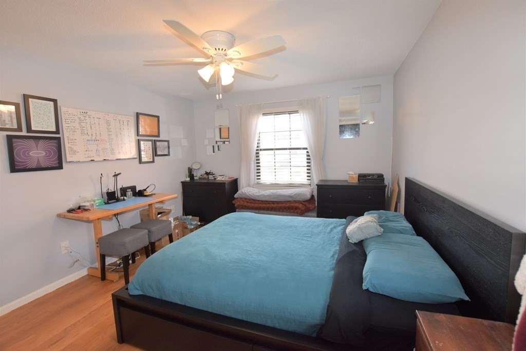 88 Charles Street, Unit 1 Waltham, MA 02453 - Photo 8 of 14 a living room with furniture and a window