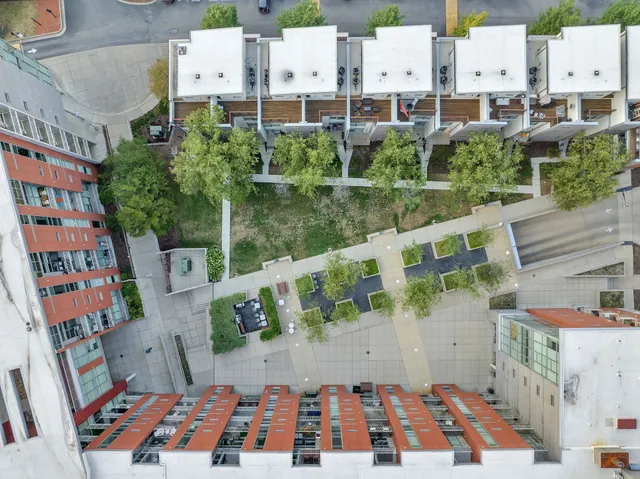 a view of a swimming pool with a table and chairs