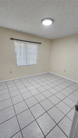 a view of a pathway of a house with wooden floor