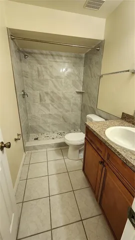 a view of a pathway with a backyard