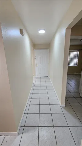 a kitchen with stainless steel appliances a sink and cabinets