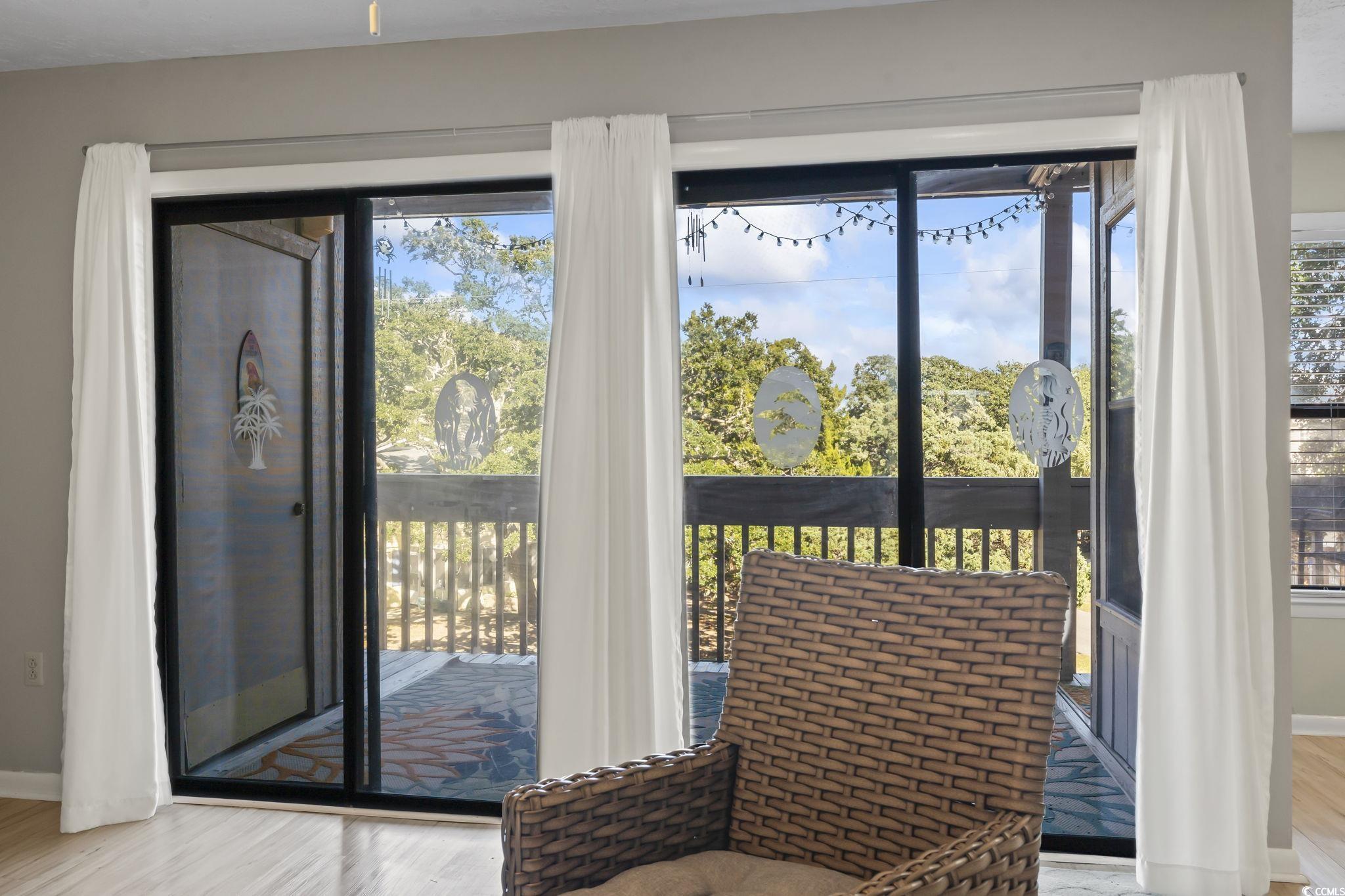310 5th Avenue North, Unit 206 Surfside Beach, SC 29575 - Photo 29 of 40 Entryway featuring wood finished floors