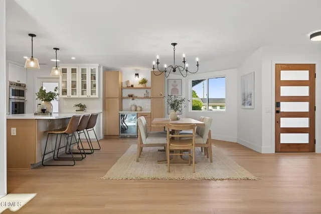 a view of a dining room kitchen and a window