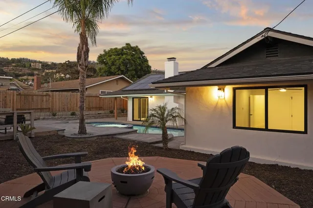 a view of a back yard of the house