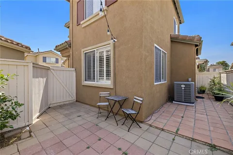 a view of an outdoor space with a lounge chair