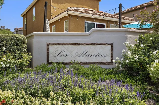 a view of a house with a garden