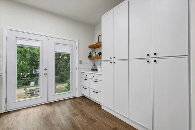 a view of cabinets and window