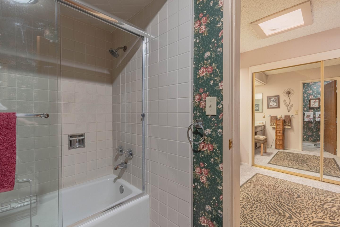 14190 Reservation Road Salinas, CA 93908 - Photo 20 of 34 a bathroom with a bathtub