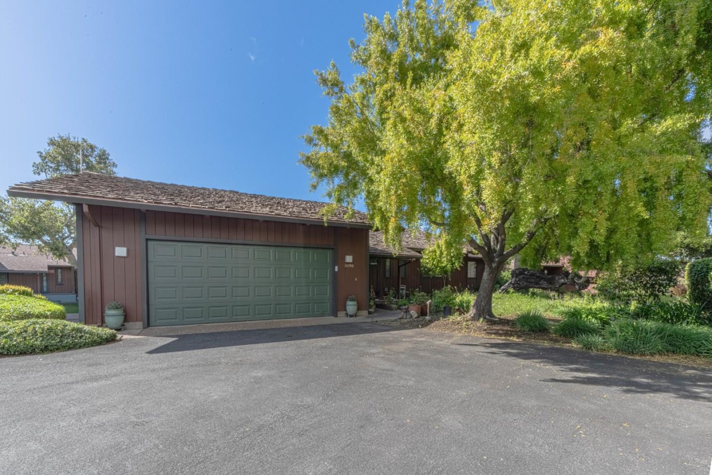 14190 Reservation Road Salinas, CA 93908 - Photo 29 of 34 a view of a house with a yard and garage