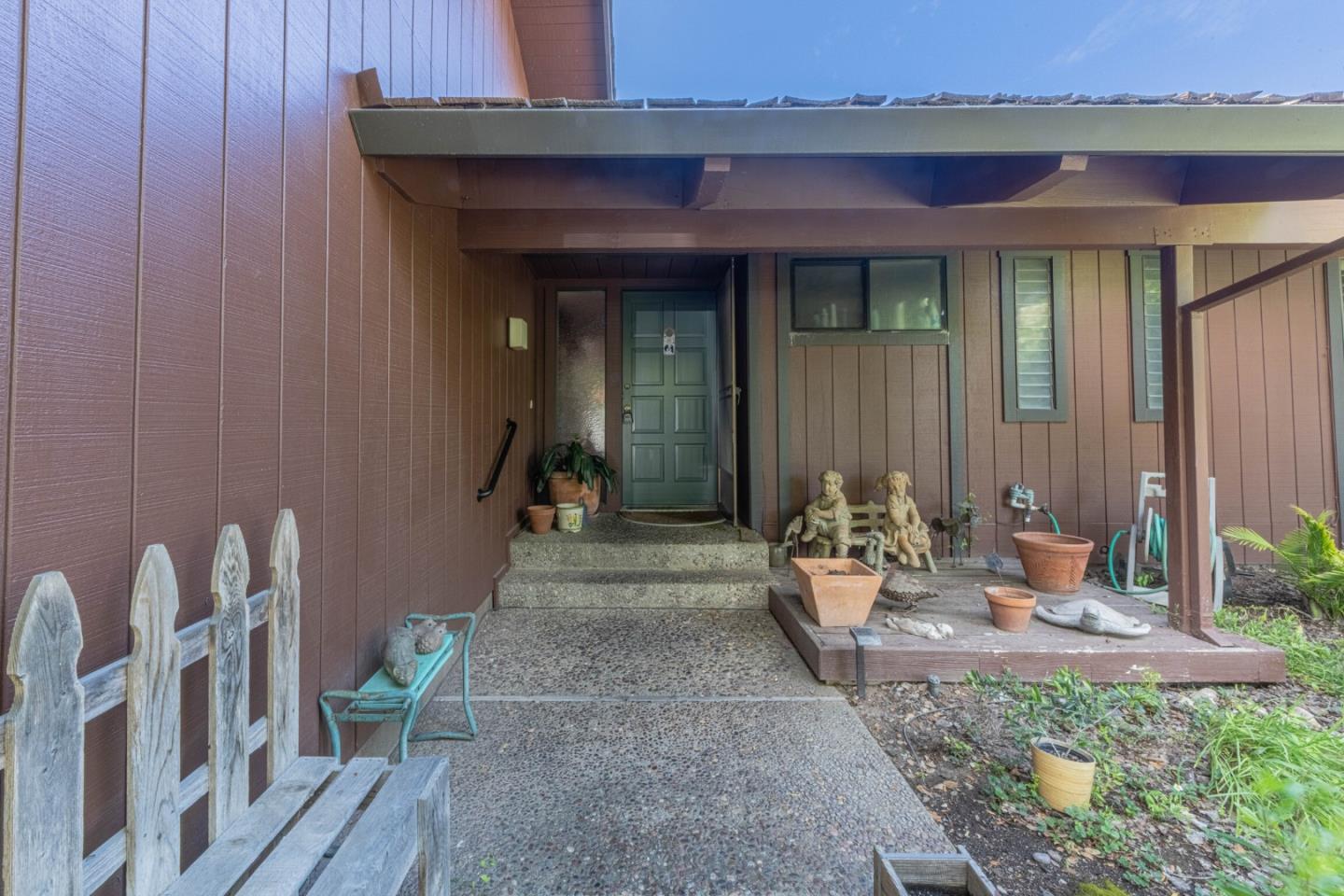 14190 Reservation Road Salinas, CA 93908 - Photo 3 of 34 a front view of a house with outdoor seating