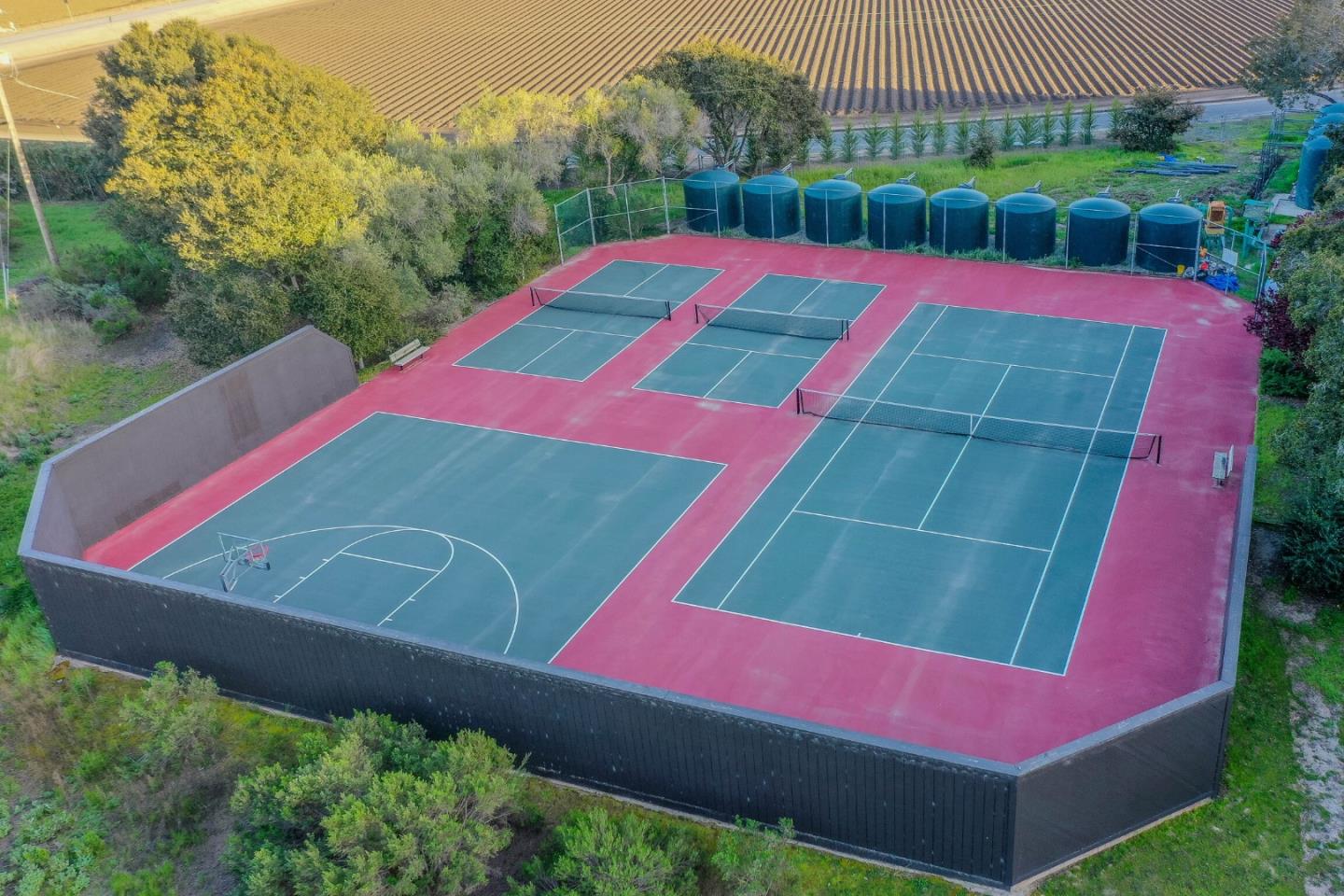 14190 Reservation Road Salinas, CA 93908 - Photo 31 of 34 a view of a tennis ground with a yard