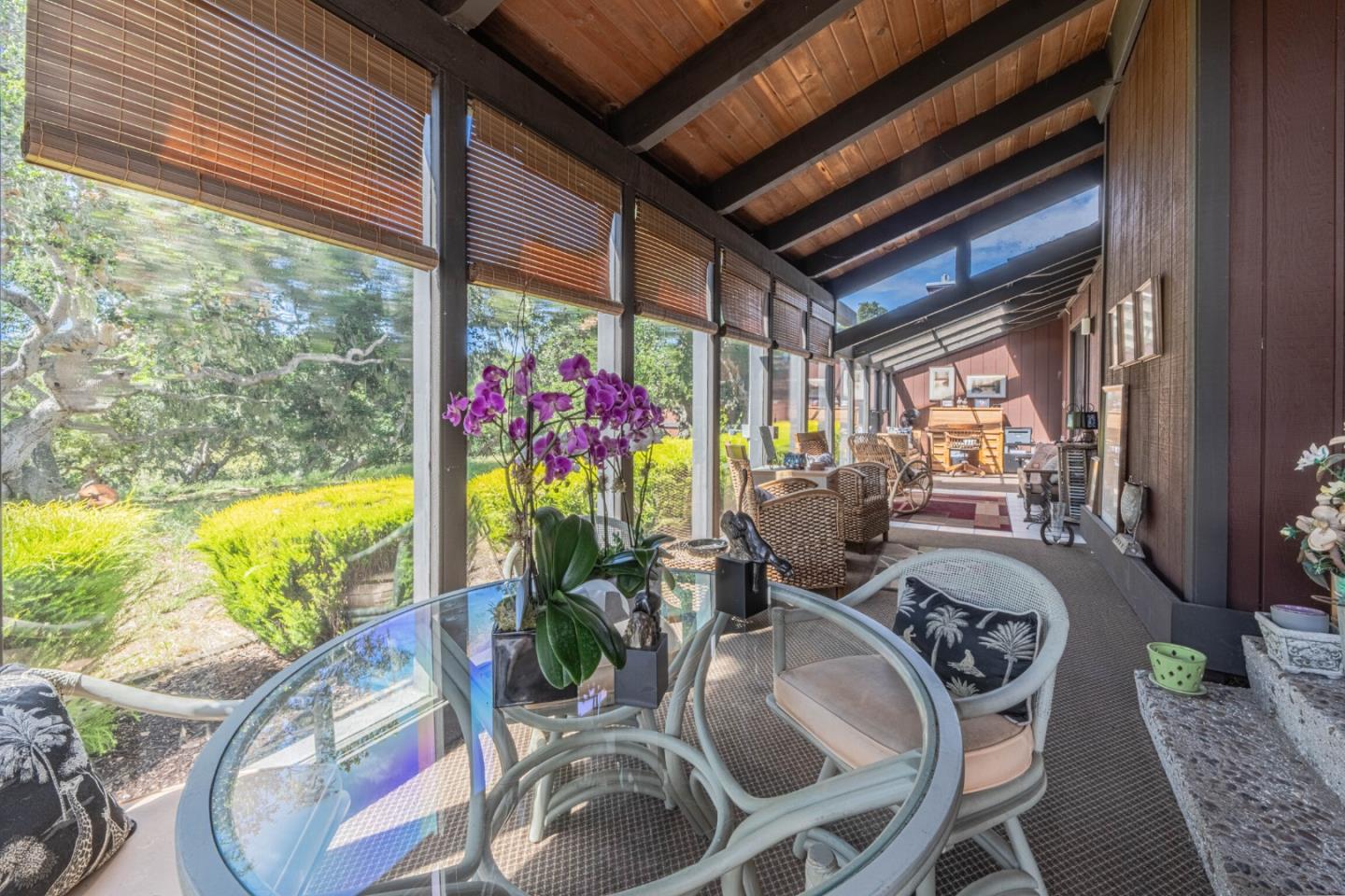 14190 Reservation Road Salinas, CA 93908 - Photo 10 of 34 a view of a dining room with furniture a chandelier and wooden floor