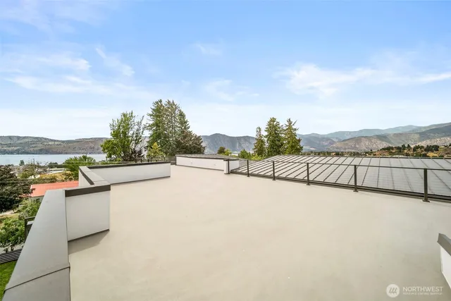 a view of a terrace with yard