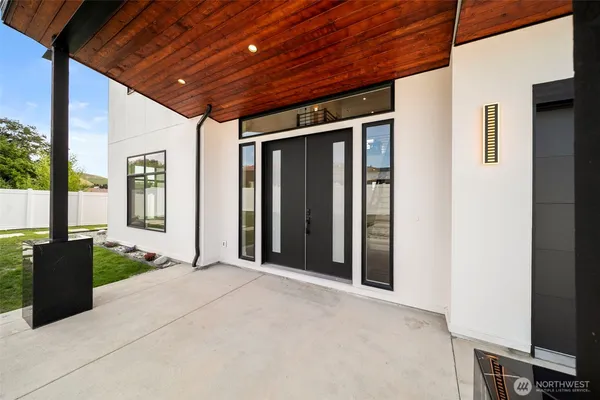 a view of a porch with wooden floor and outer view